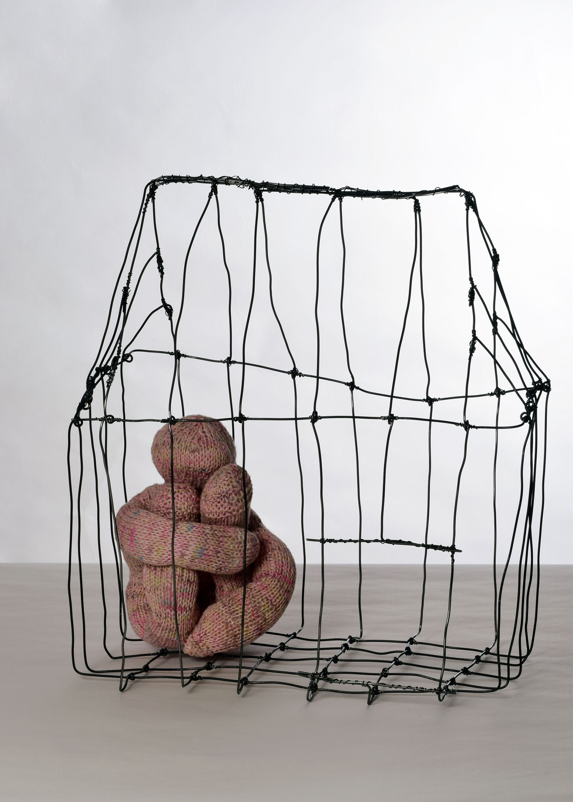 Sculpture with cage